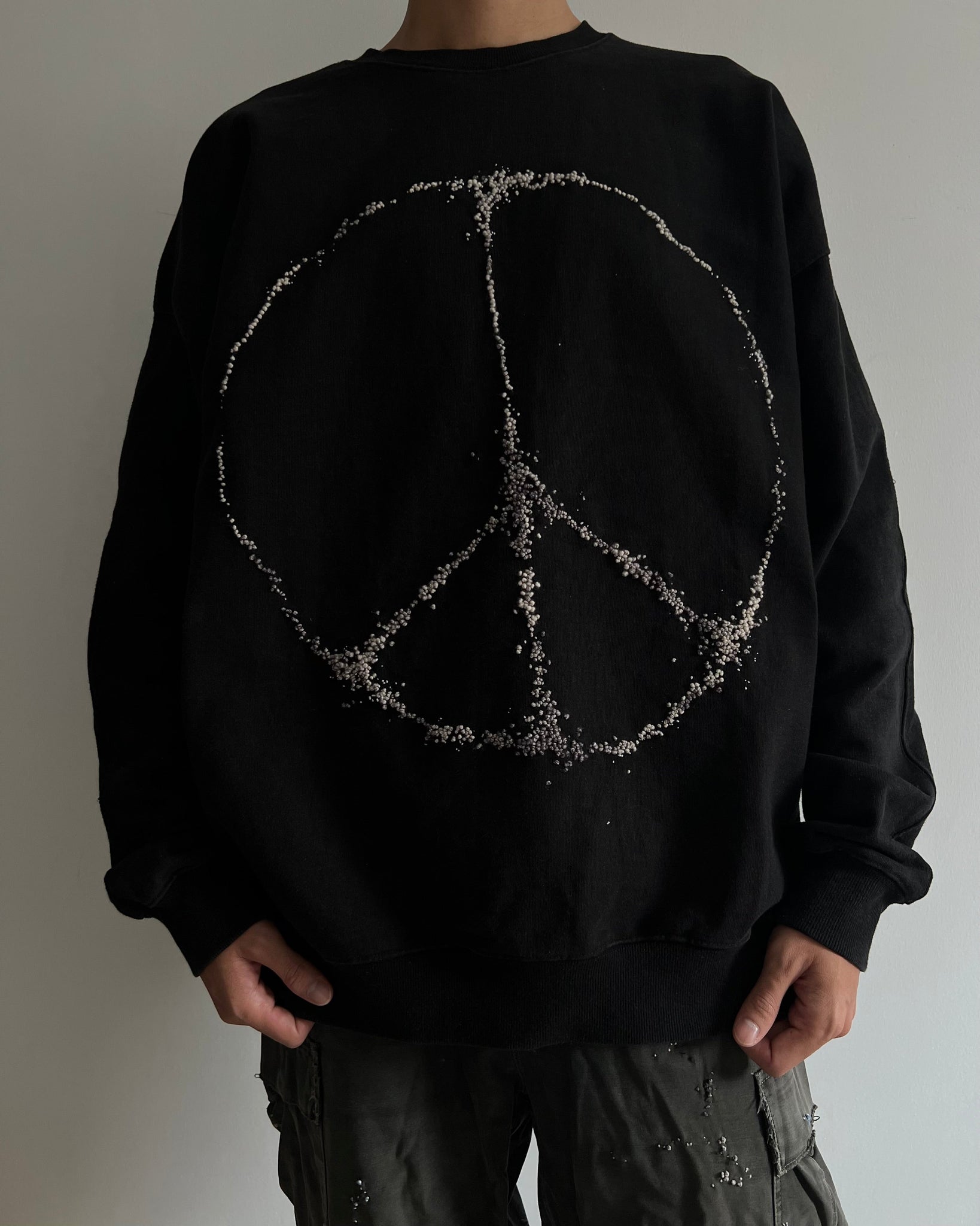 """Embroidered Dot PEACE Sweater