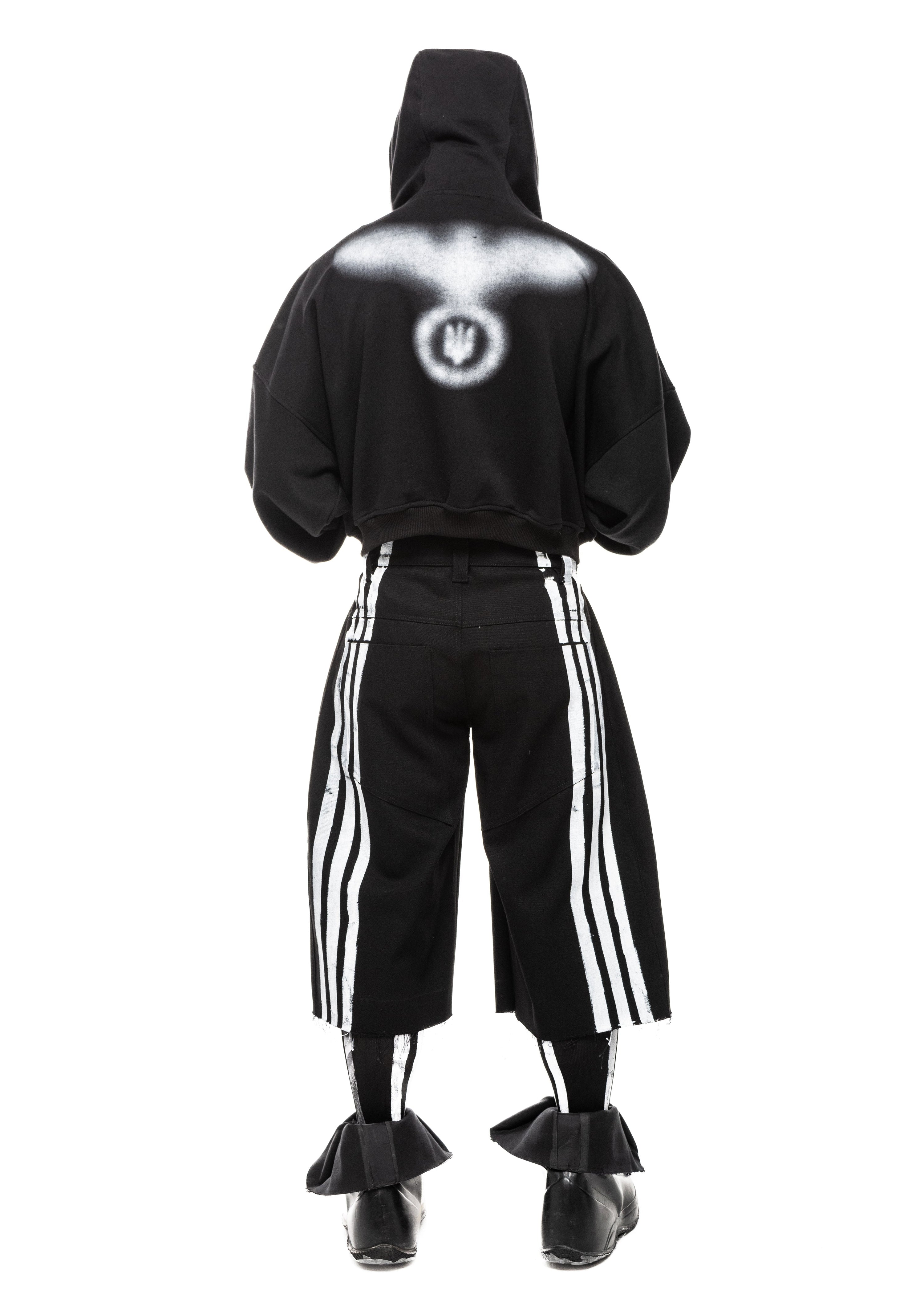 Back view of silk-screened striped denim shorts in black