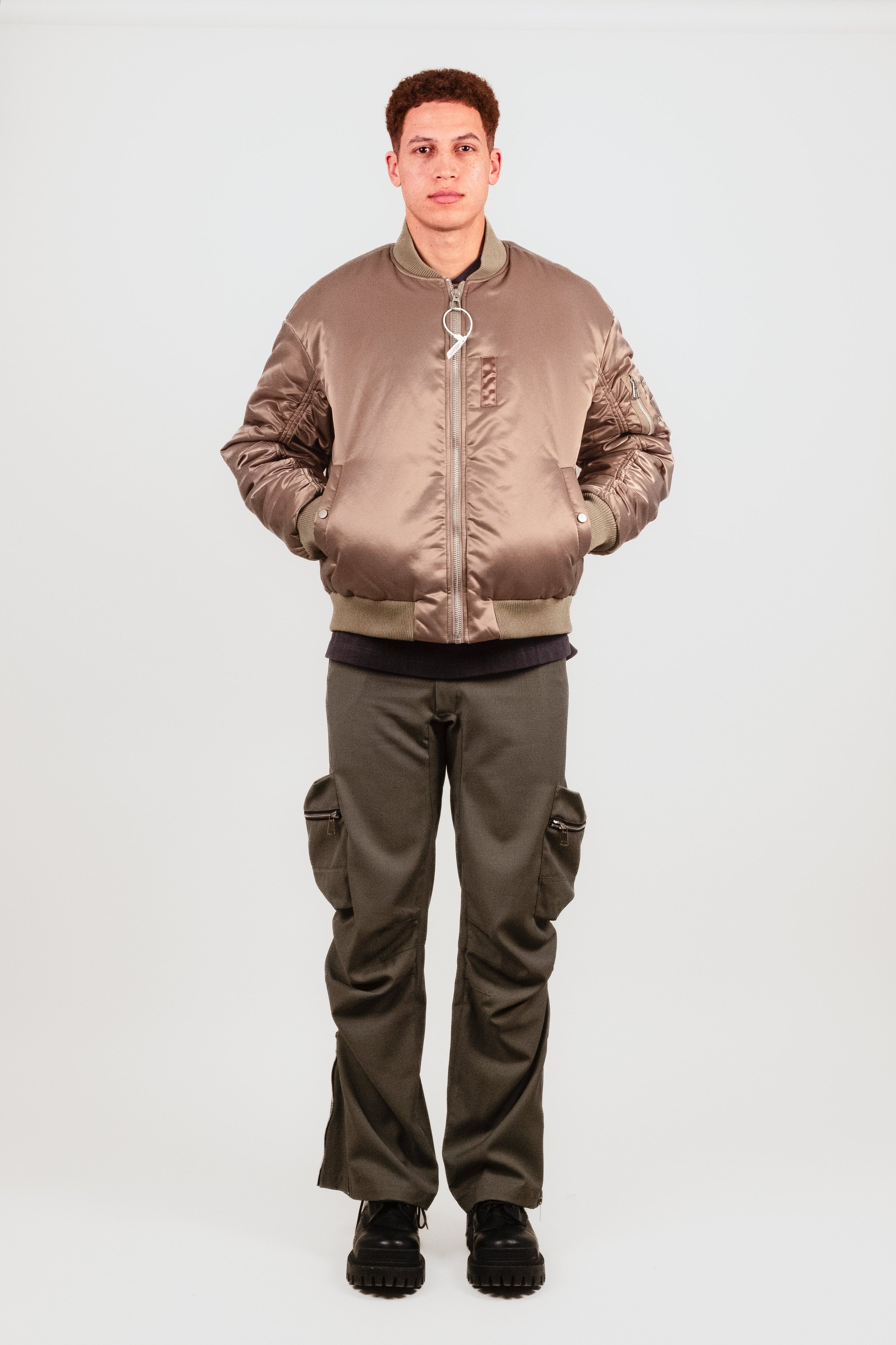 Alternate front view of Nate in the Ruched Bomber — luxe reinterpretation of vintage bomber with sleeve ruching from wrist to shoulder seam.