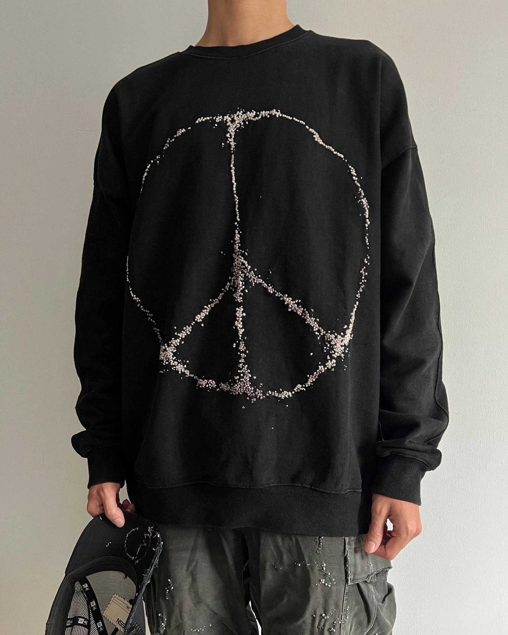 """Embroidered Dot PEACE Sweater