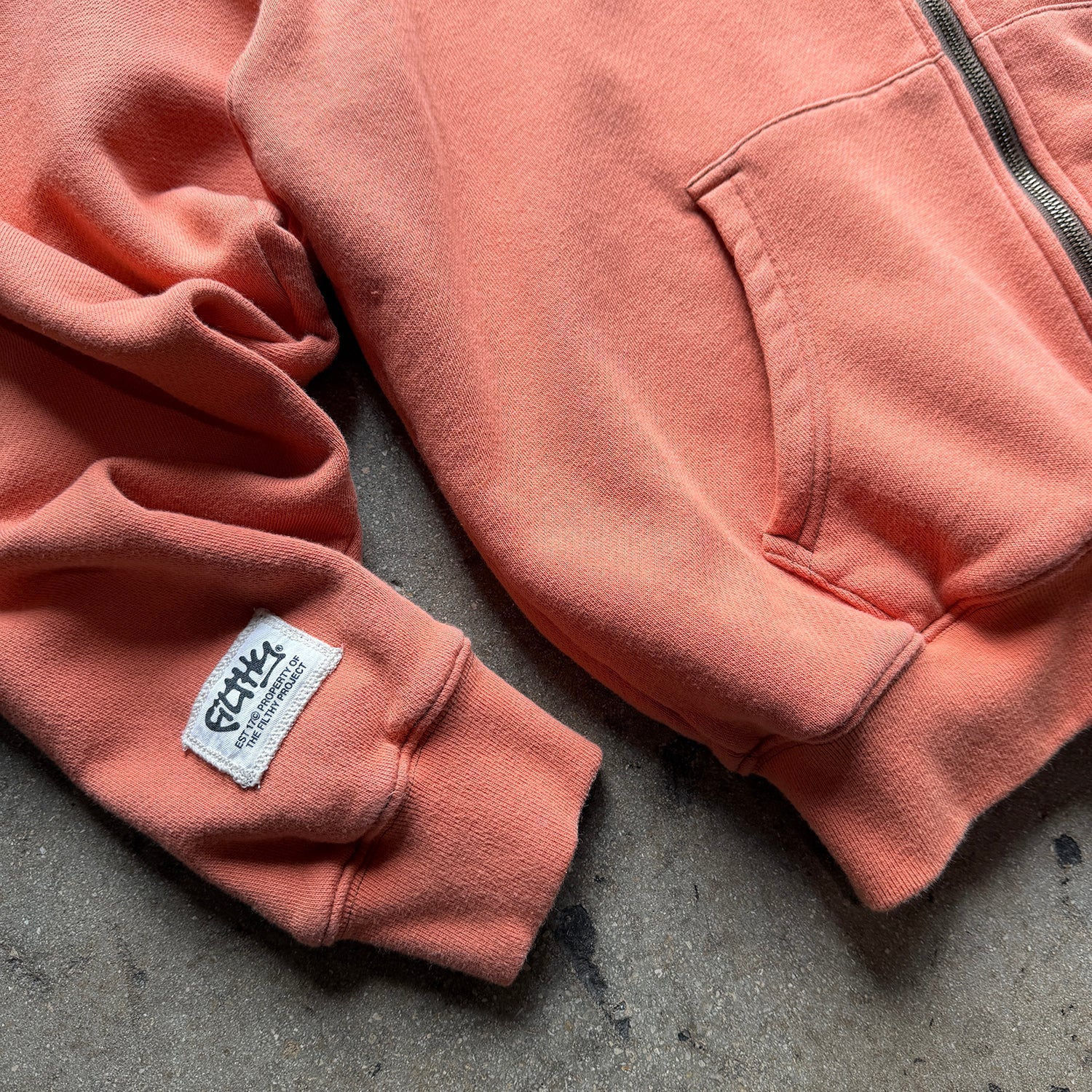 filthy® lightweight zip-up (light orange)