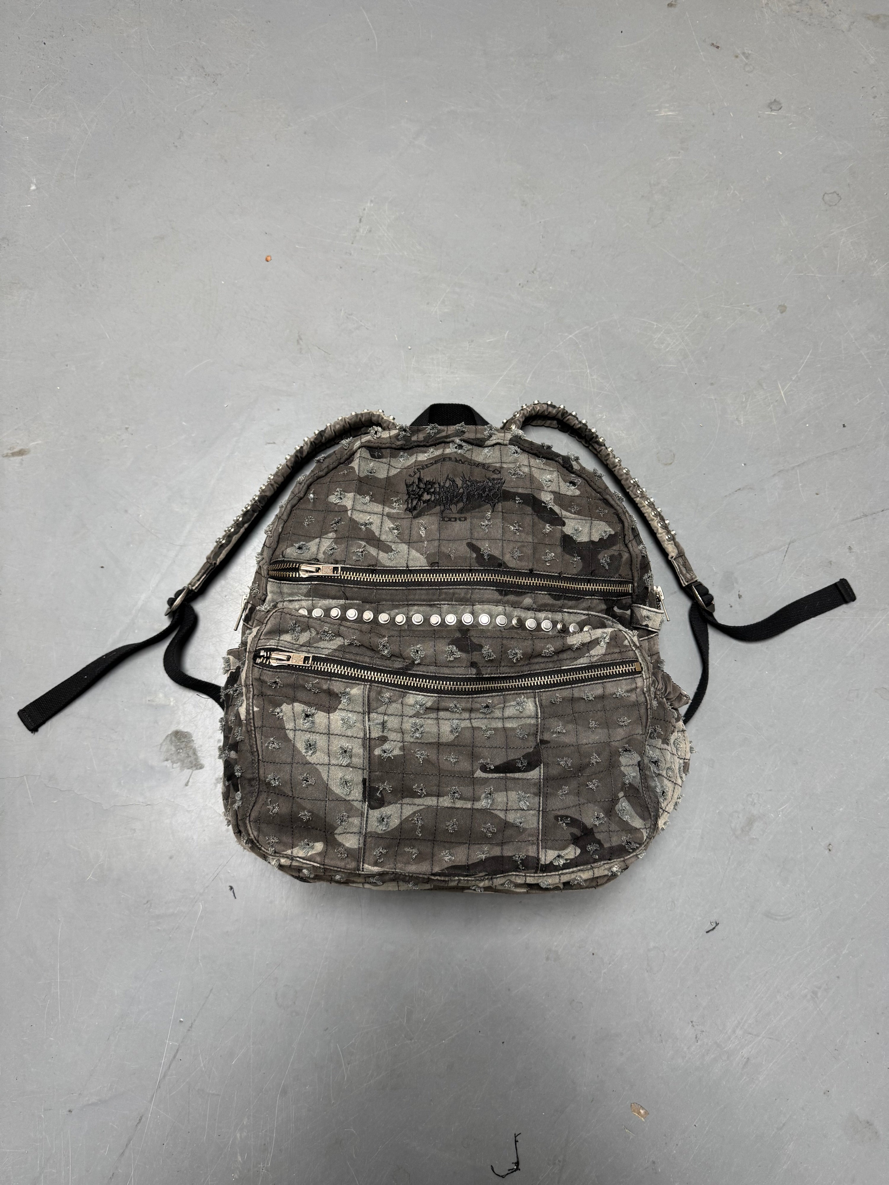 CAMMO TRASHED DENIM BACKPACK