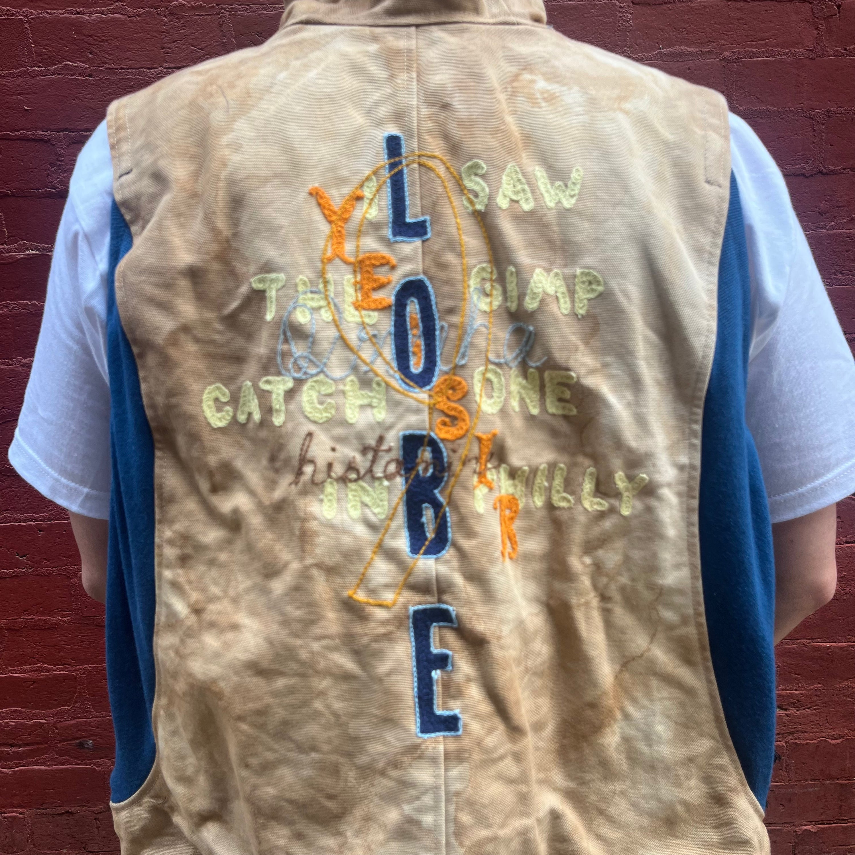 Synch Vest - Persimmon Canvas With Chainstitch Text Smear #2