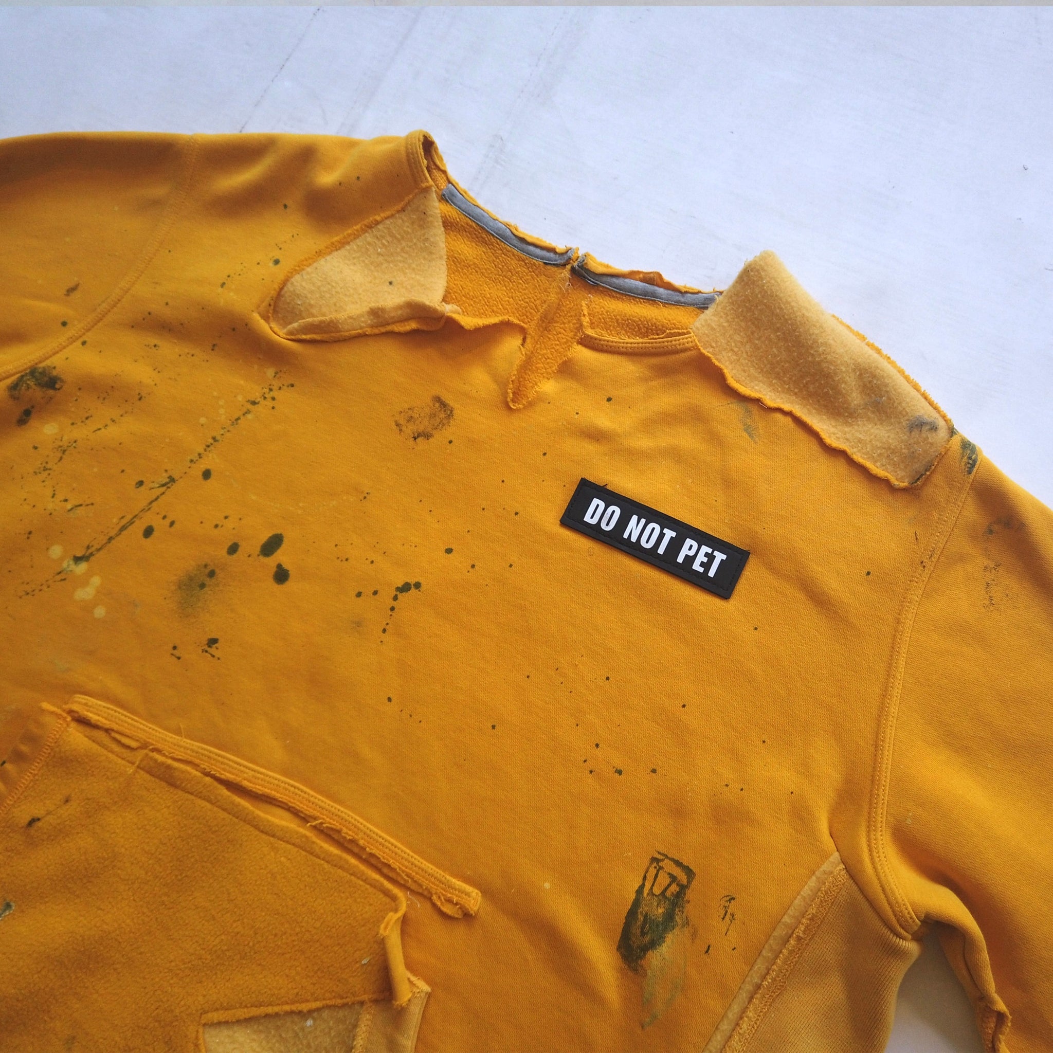 Distressed “Do Not Pet” Crewneck