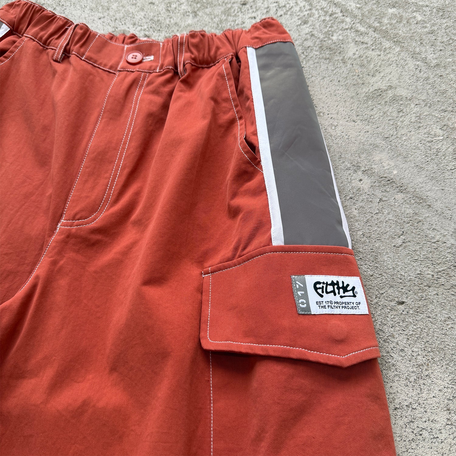 filthy® hyper-trek cargo short (rust)