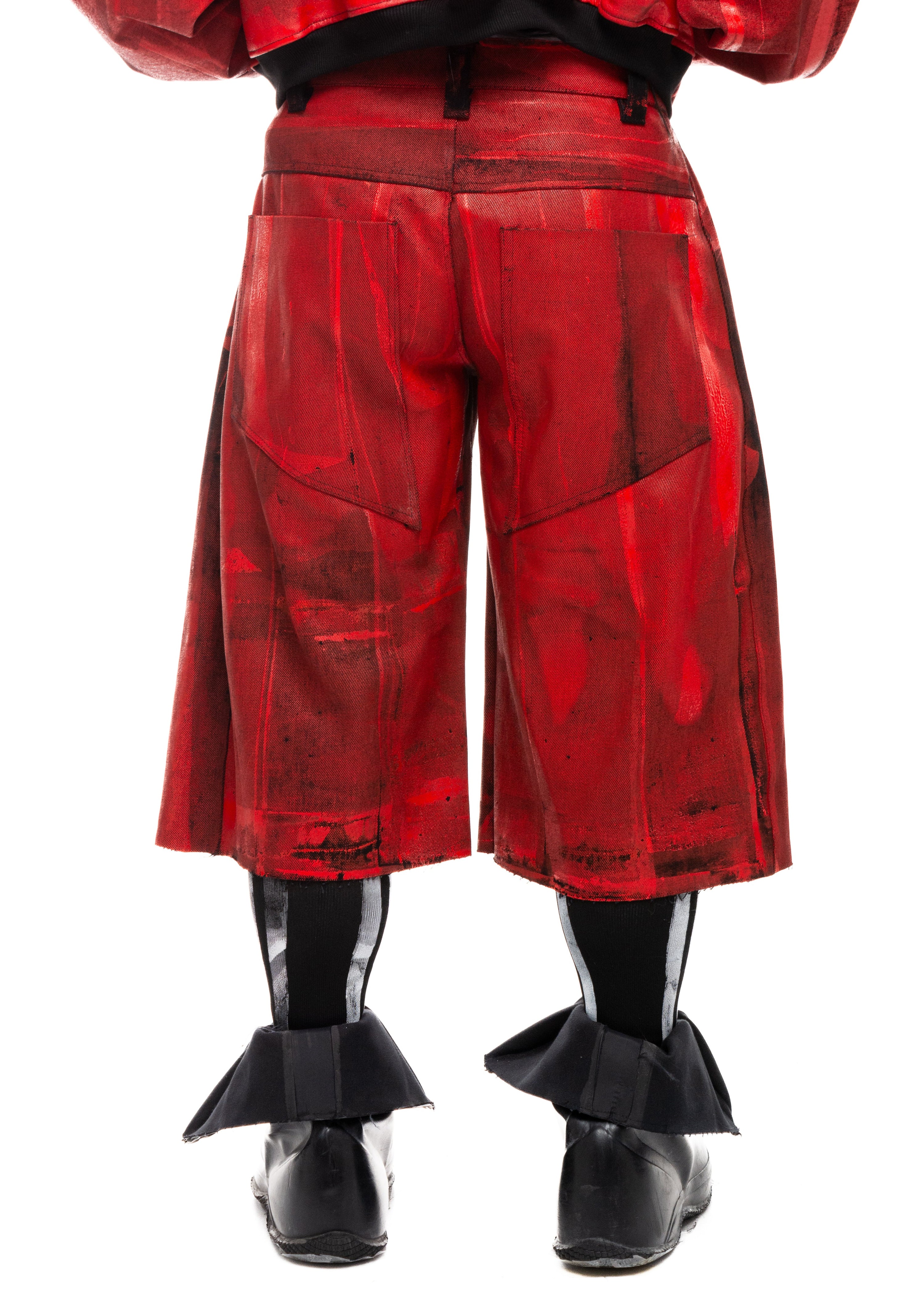 Close-up of back pockets and red coated finish